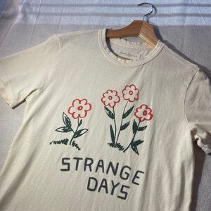 Cream Graphic T-Shirt with Floral Design